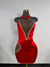 red halter dress with heart side cutout trimmed in silver rhinestones by Bellz Couture Detroit on mannequin against plan wall